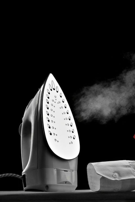 Steam iron with seloplate